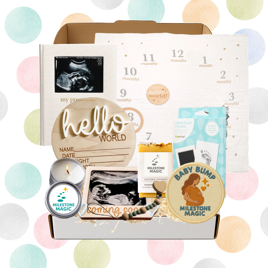 Pregnancy milestone box with ultrasound photos, milestone blanket, wooden hello world sign, and baby bump tracker